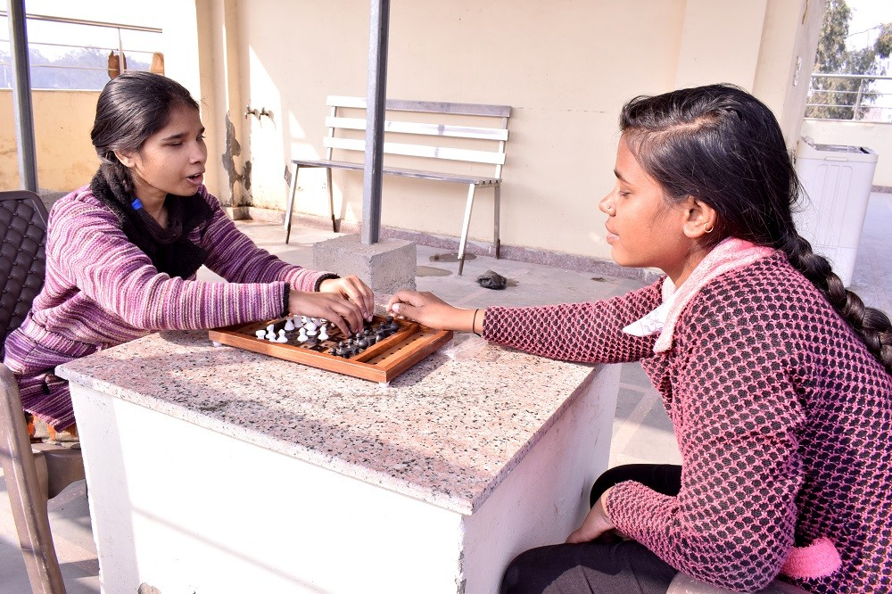 BLIND GIRLS PLAYING ACCESSABLE CHESS AT BWS